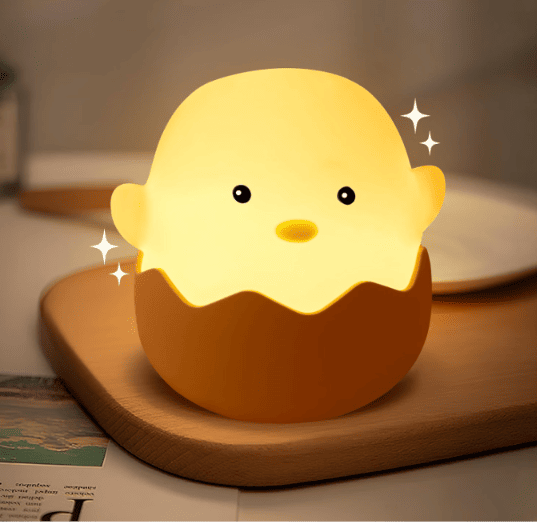 Lámpara de pollito para niños con luz tenue.